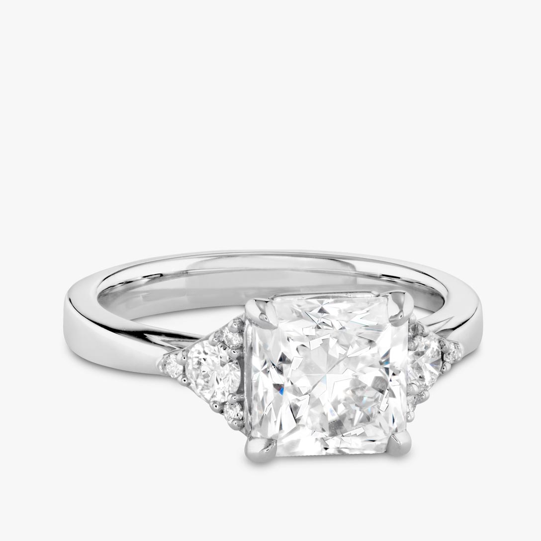 Sidestone diamond engagement ring